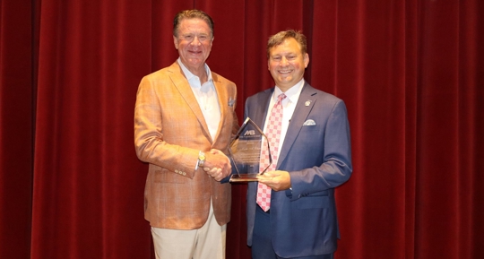 Image of Mark receiving his award
